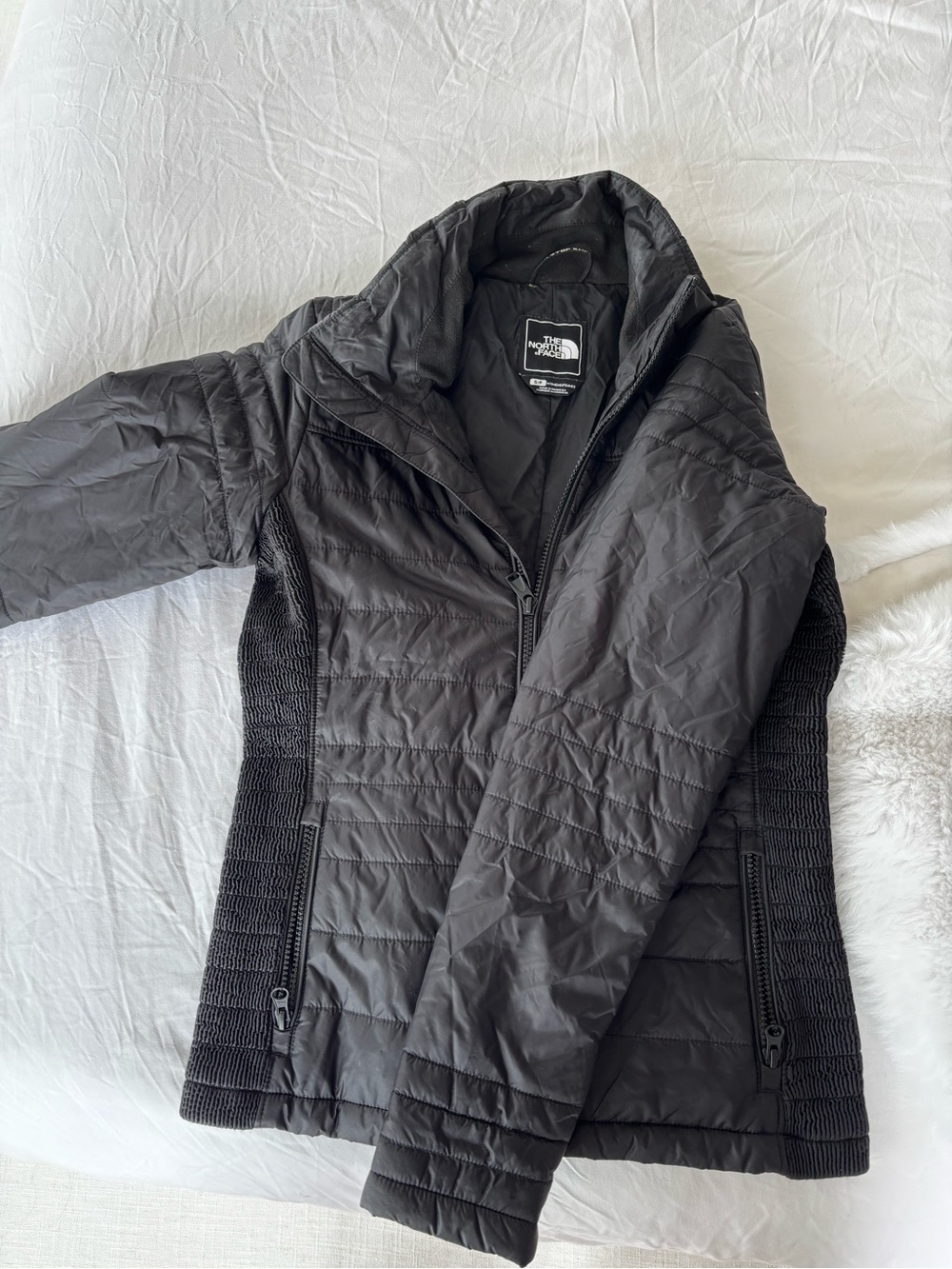 The North Face Women's Black Quilted Puffer Jacket with Stretch Side Panels